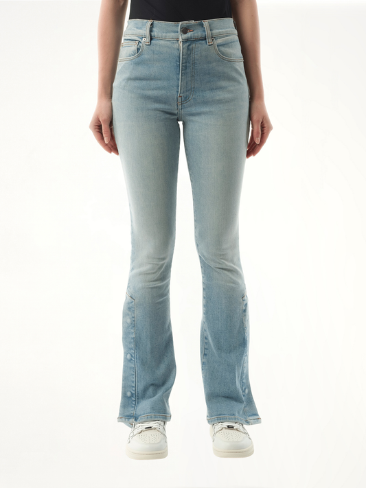 Image of a model wearing Denim. Productname: AMIRI Kick Flare Jeans in BLUE colour by brand - AMIRI
