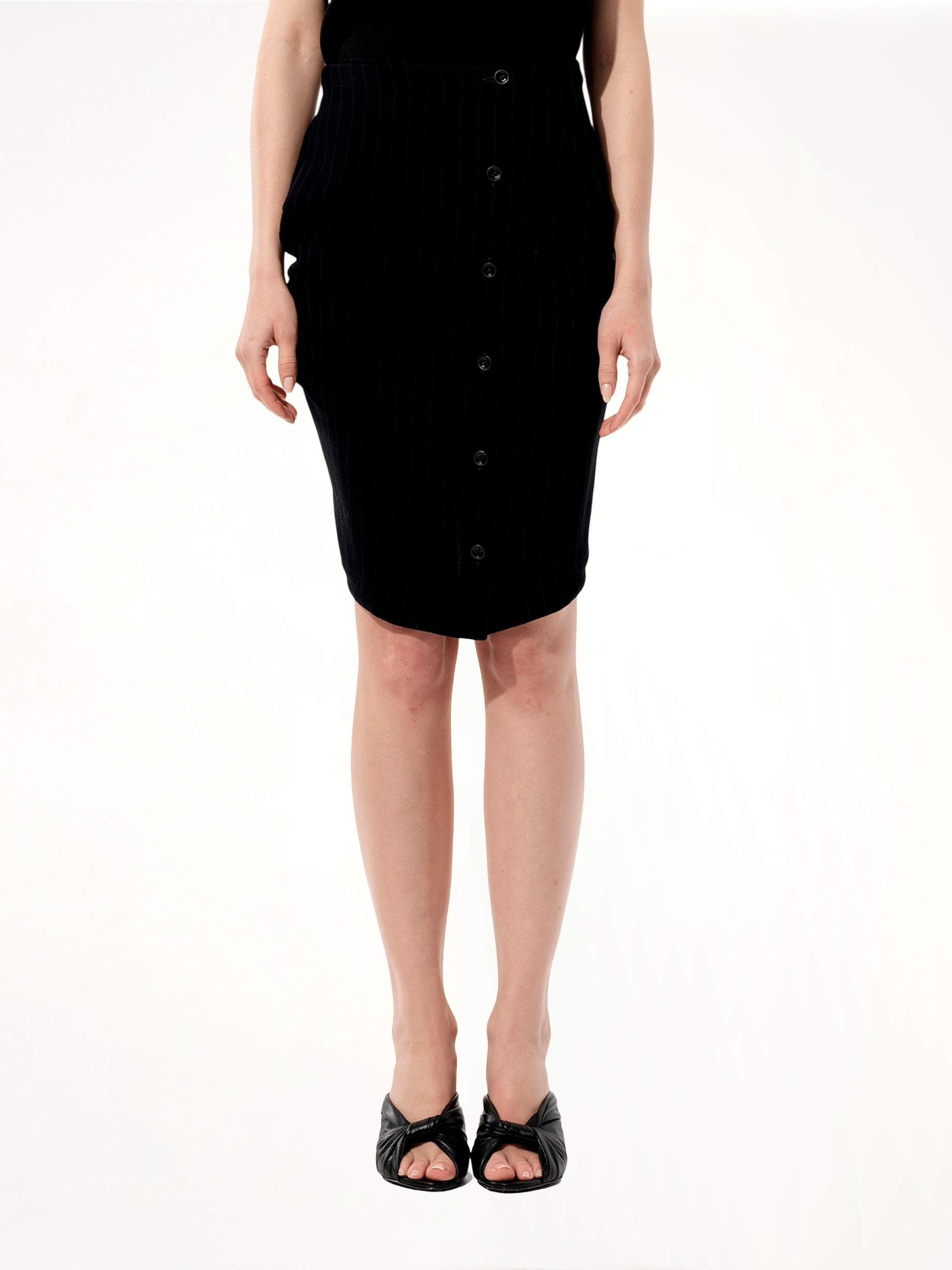Image of a model wearing Skirts. Product name - Skirt in Black colour by brand - BALENCIAGA