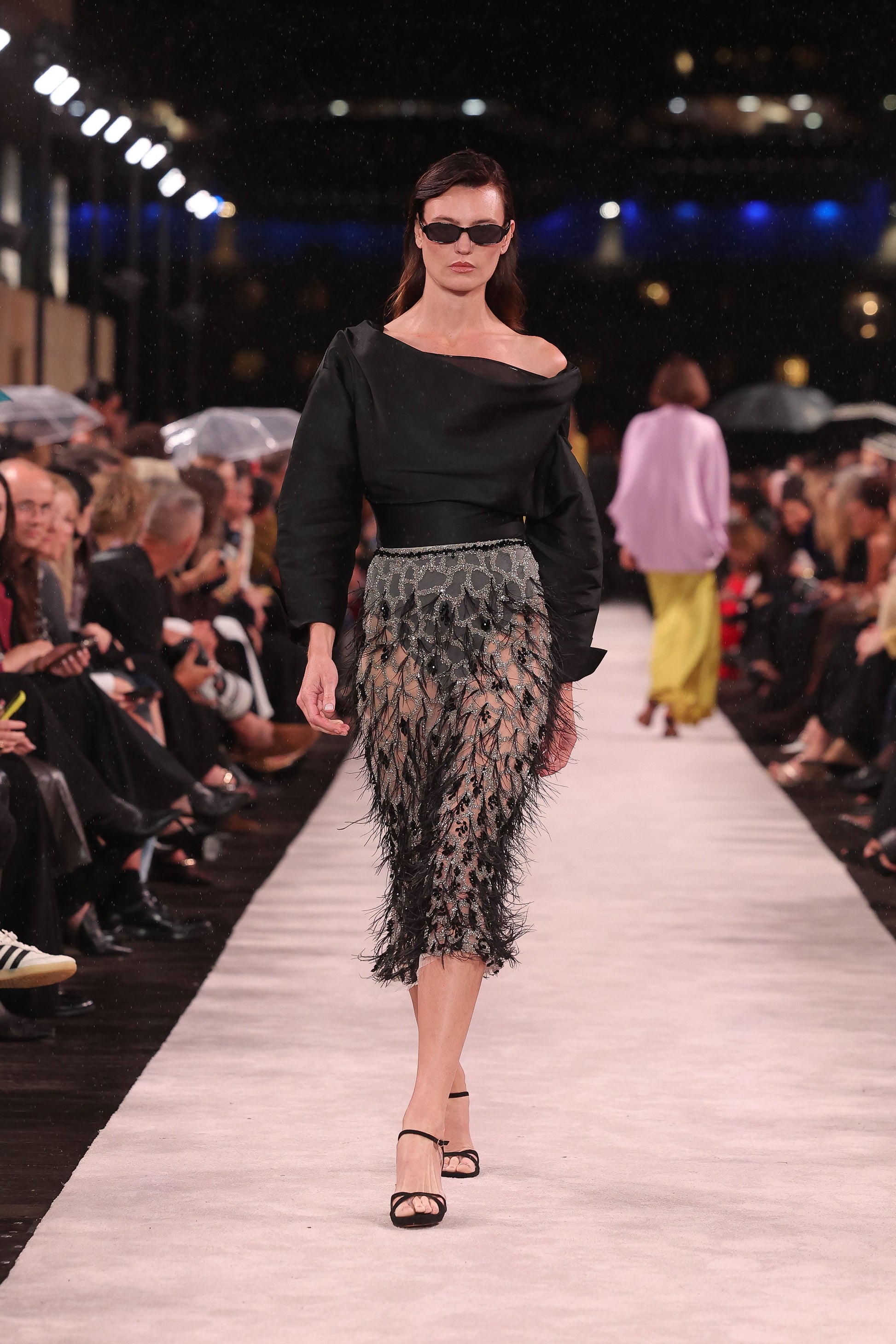 Image of a model wearing Tops. Product name - Black Matte Sateen Scultped Bodysuit in Black colour by brand - Carla Zampatti