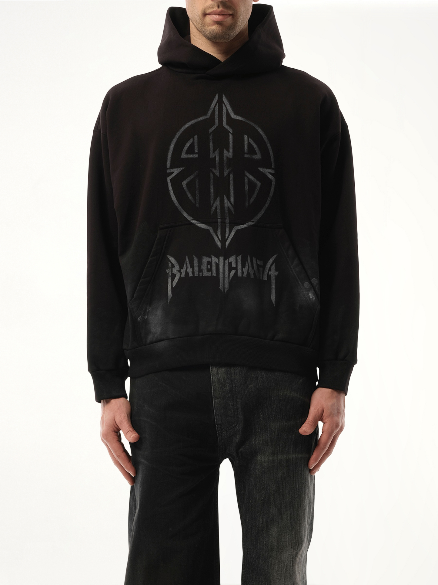 Image of a model wearing Outerwear. Productname: BALENCIAGA BB Logo Painted Hoodie in BLACK colour by brand - BALENCIAGA