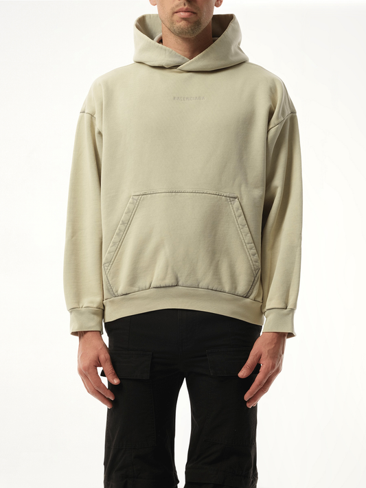Image of a model wearing Outerwear. Productname: BALENCIAGA Back Embroidered Medium Fit Hoodie in Grey colour by brand - BALENCIAGA