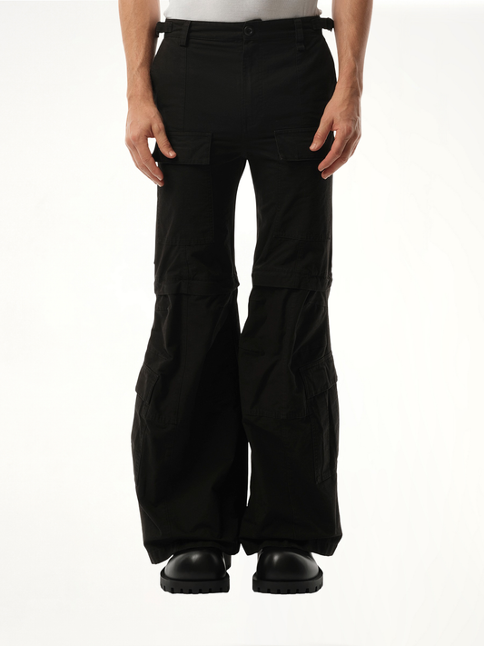 Image of a model wearing Pants. Productname: BALENCIAGA Flared Cargo Pants in Black colour by brand - BALENCIAGA