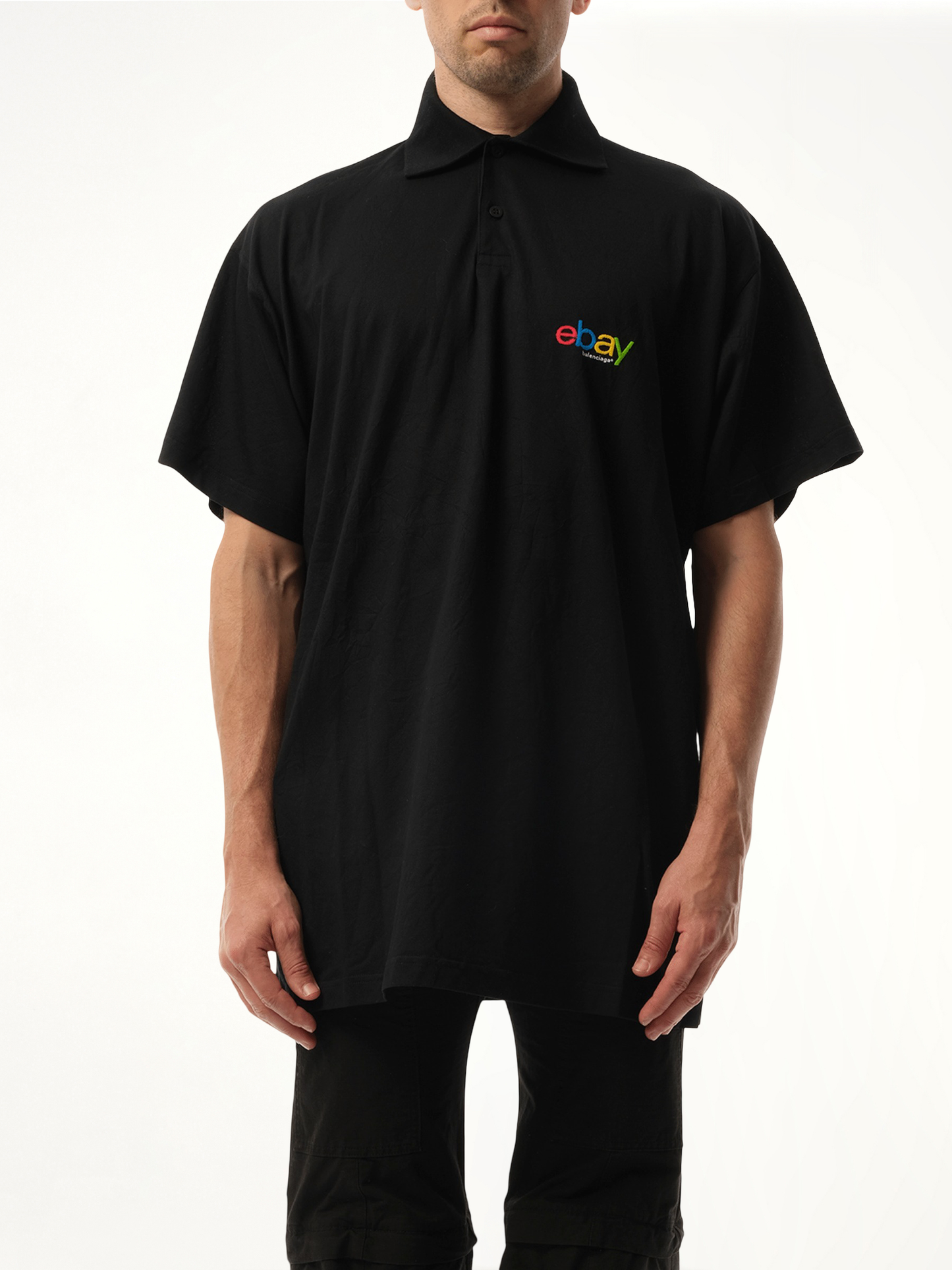 Image of a model wearing Tops. Productname: BALENCIAGA Ebay Polo in BLACK colour by brand - BALENCIAGA