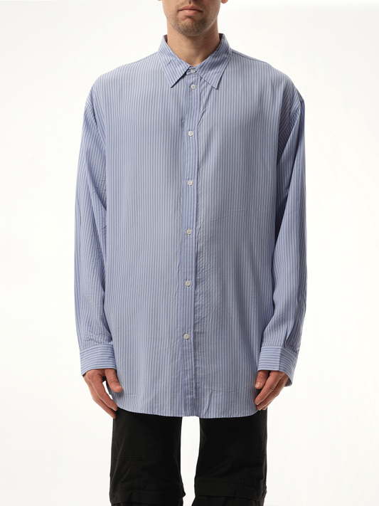 Image of a model wearing Tops. Productname: BALENCIAGA Fluid Stripe Shirt in Blue colour by brand - BALENCIAGA