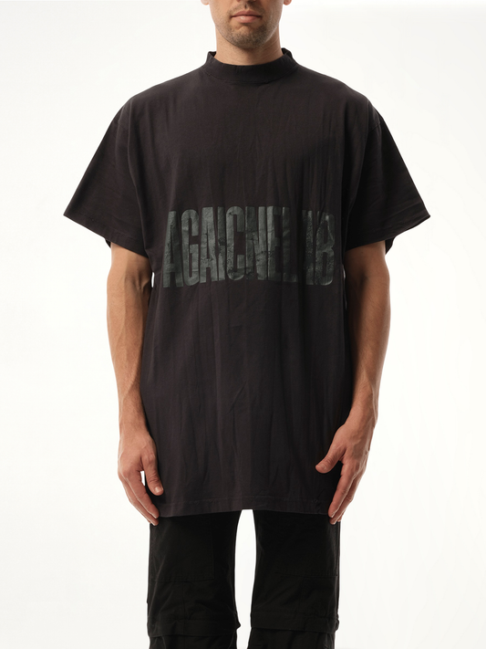 Image of a model wearing Tops. Productname: BALENCIAGA AGAICNELAB Oversized T-Shirt in BLACK colour by brand - BALENCIAGA