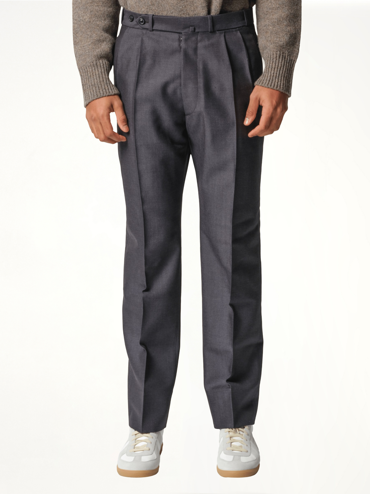 Image of a model wearing Pants. Productname: MAISON MARGIELA British Mohair Suit Pants in BLACK colour by brand - MAISON MARGIELA