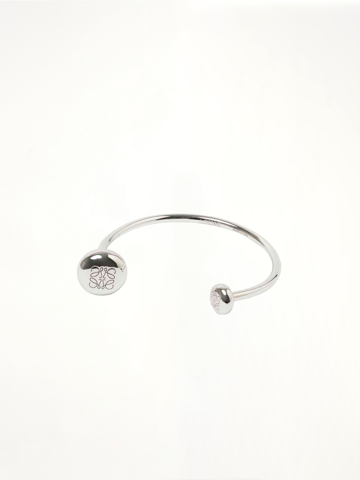 Image of Bracelets. Product name - Anagram Pebble Cuff in Silver colour by brand - LOEWE