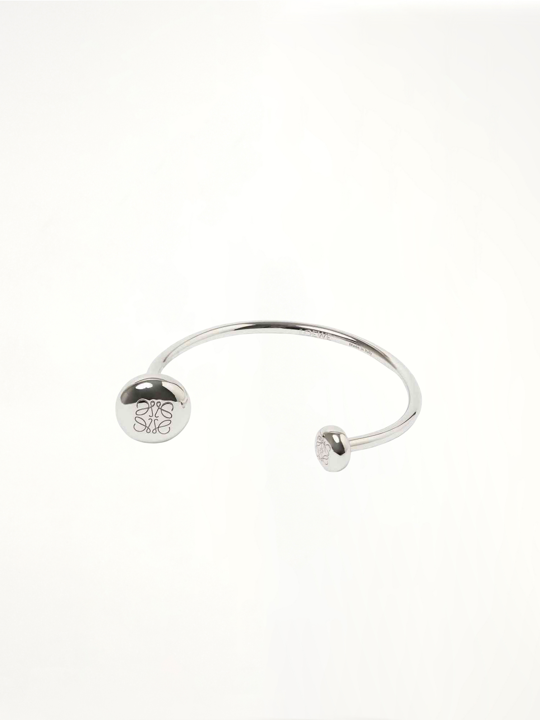 Image of Bracelets. Product name - Anagram Pebble Cuff in Silver colour by brand - LOEWE