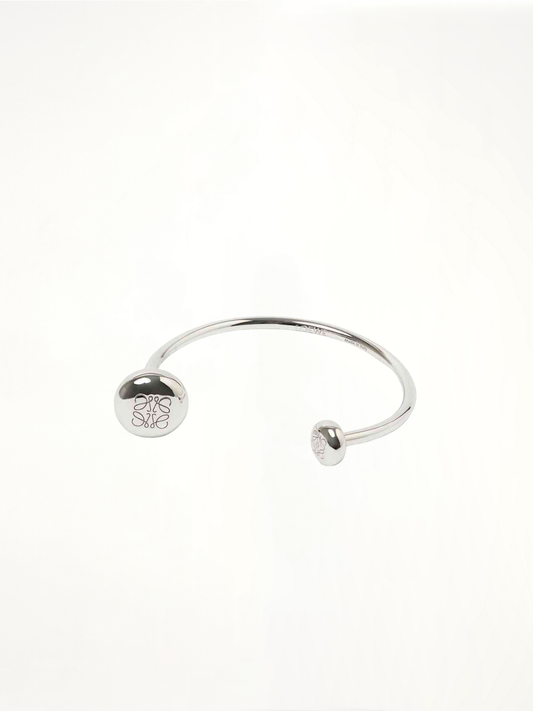 Image of Bracelets. Product name - Anagram Pebble Cuff in Silver colour by brand - LOEWE