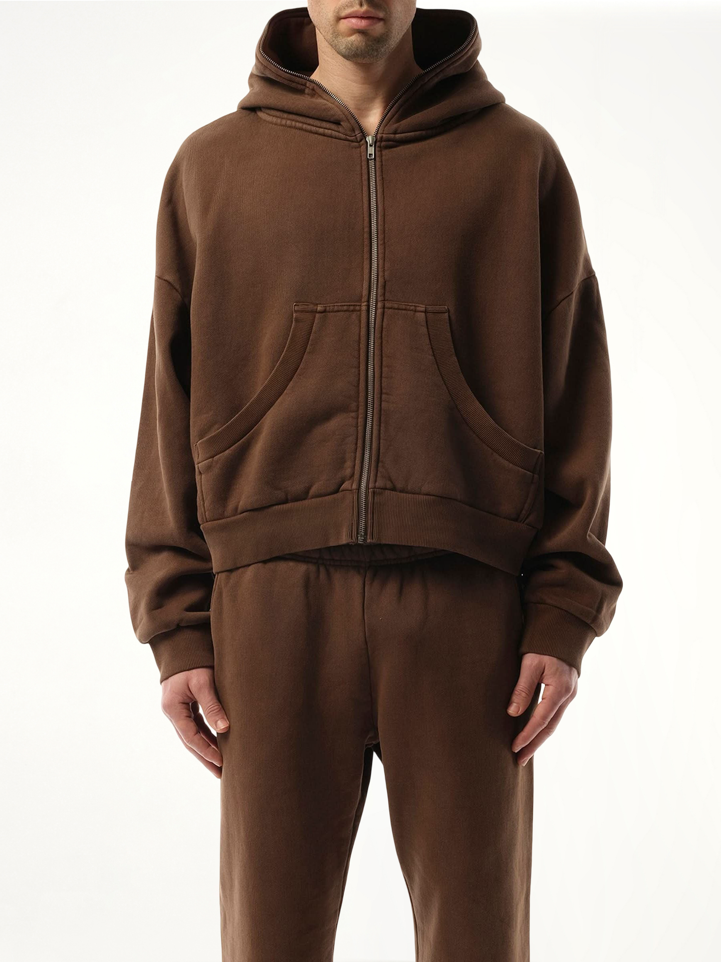 Image of a model wearing Outerwear. Productname: ENTIRE STUDIOS Eternal Zip Hoodie in Brown colour by brand - ENTIRE STUDIOS