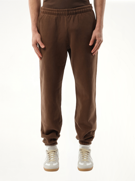 Image of a model wearing Pants. Productname: ENTIRE STUDIOS Heavy Sweatpants in BROWN colour by brand - ENTIRE STUDIOS