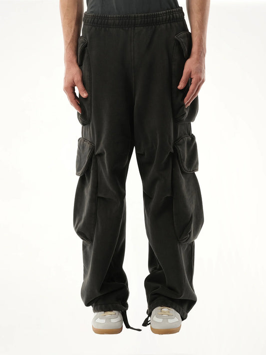Image of a model wearing Pants. Product name - Heavy Gocar Sweatpants in Black colour by brand - ENTIRE STUDIOS