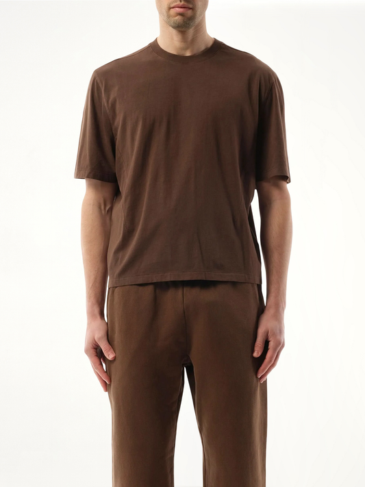 Image of a model wearing Tops. Productname: ENTIRE STUDIOS Dart T-Shirt in Brown colour by brand - ENTIRE STUDIOS