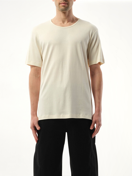 Image of a model wearing Tops. Productname: LEMAIRE Rib U Neck T-Shirt in Light Cream colour by brand - LEMAIRE