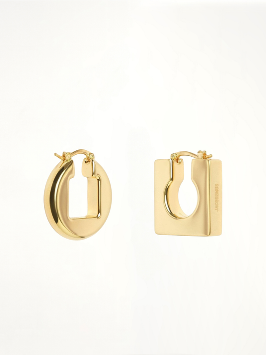 Image of Earrings. Productname: JACQUEMUS Les Boucles Rond Carre Earrings in GOLD colour by brand - JACQUEMUS