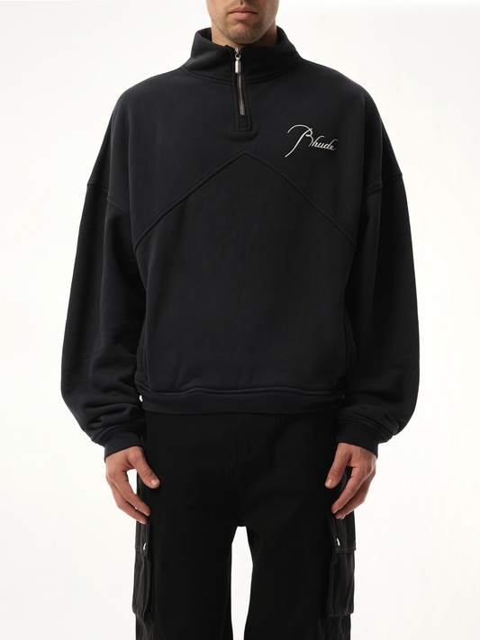 Image of a model wearing Outerwear. Productname: RHUDE Rhude Quarter Zip Sweatshirt in BLACK colour by brand - RHUDE