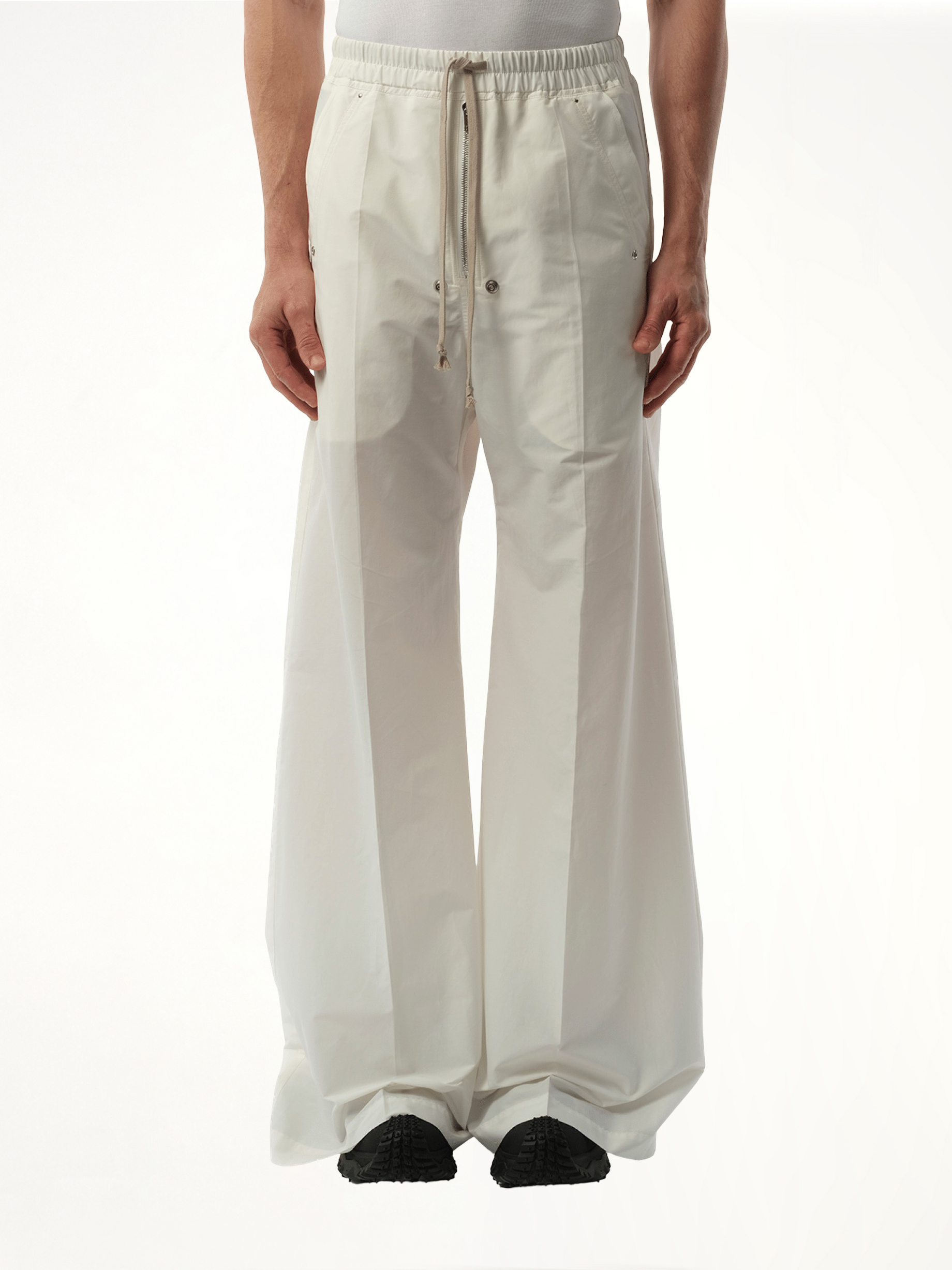 Image of a model wearing Pants. Product name - Rick Owens x Moncler Belas Pants in White colour by brand - RICK OWENS