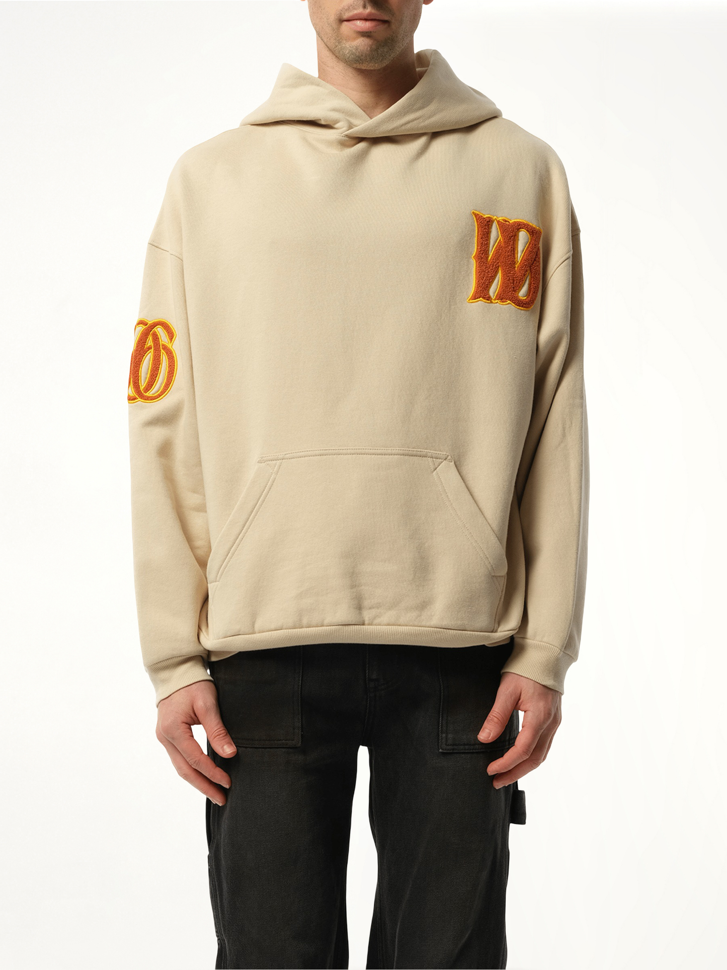 Image of a model wearing Outerwear. Productname: WE11DONE Boucle Letter Logo Hoodie in Beige colour by brand - WE11DONE