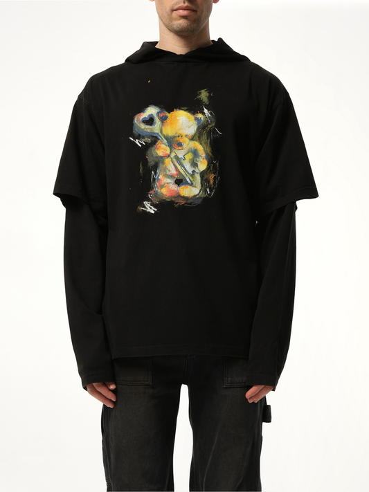 Image of a model wearing Outerwear. Productname: WE11DONE Teddy Bear With Key Hoodie in Black colour by brand - WE11DONE