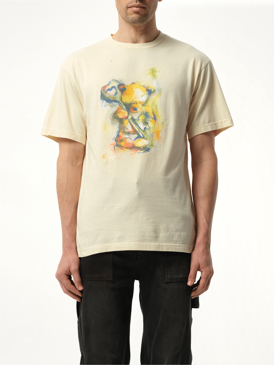 Image of a model wearing Tops. Productname: WE11DONE Teddy Bear with Key T-Shirt in Beige colour by brand - WE11DONE