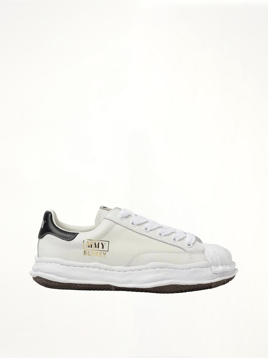 Image of Sneakers. Product name - BLAKEY OG Leather Low Top Sneaker in White colour by brand - MAISON MIHARA YASUHIRO