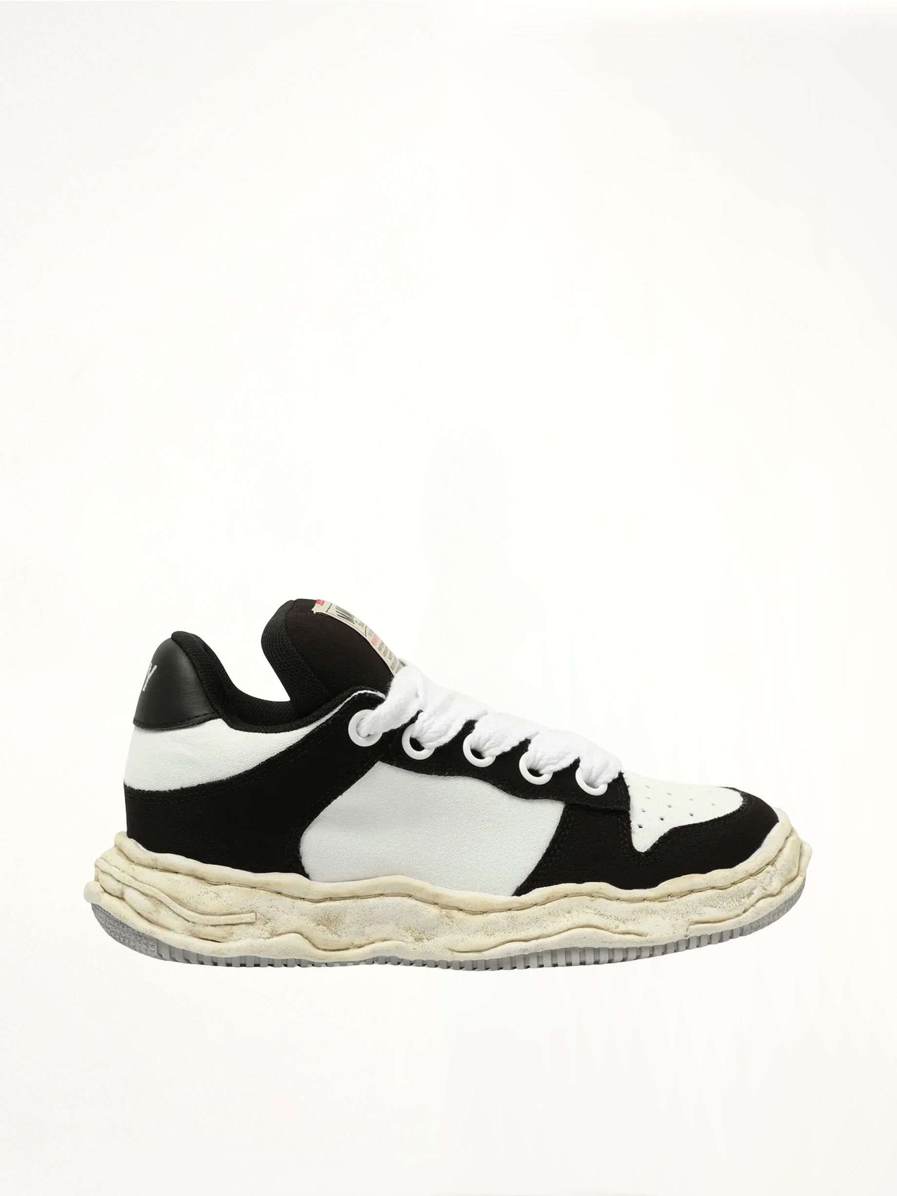 Image of Sneakers. Product name - WAYNE OG Puffer Sneaker in Black colour by brand - MAISON MIHARA YASUHIRO