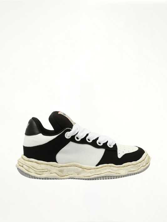 Image of Sneakers. Product name - WAYNE OG Puffer Sneaker in Black colour by brand - MAISON MIHARA YASUHIRO