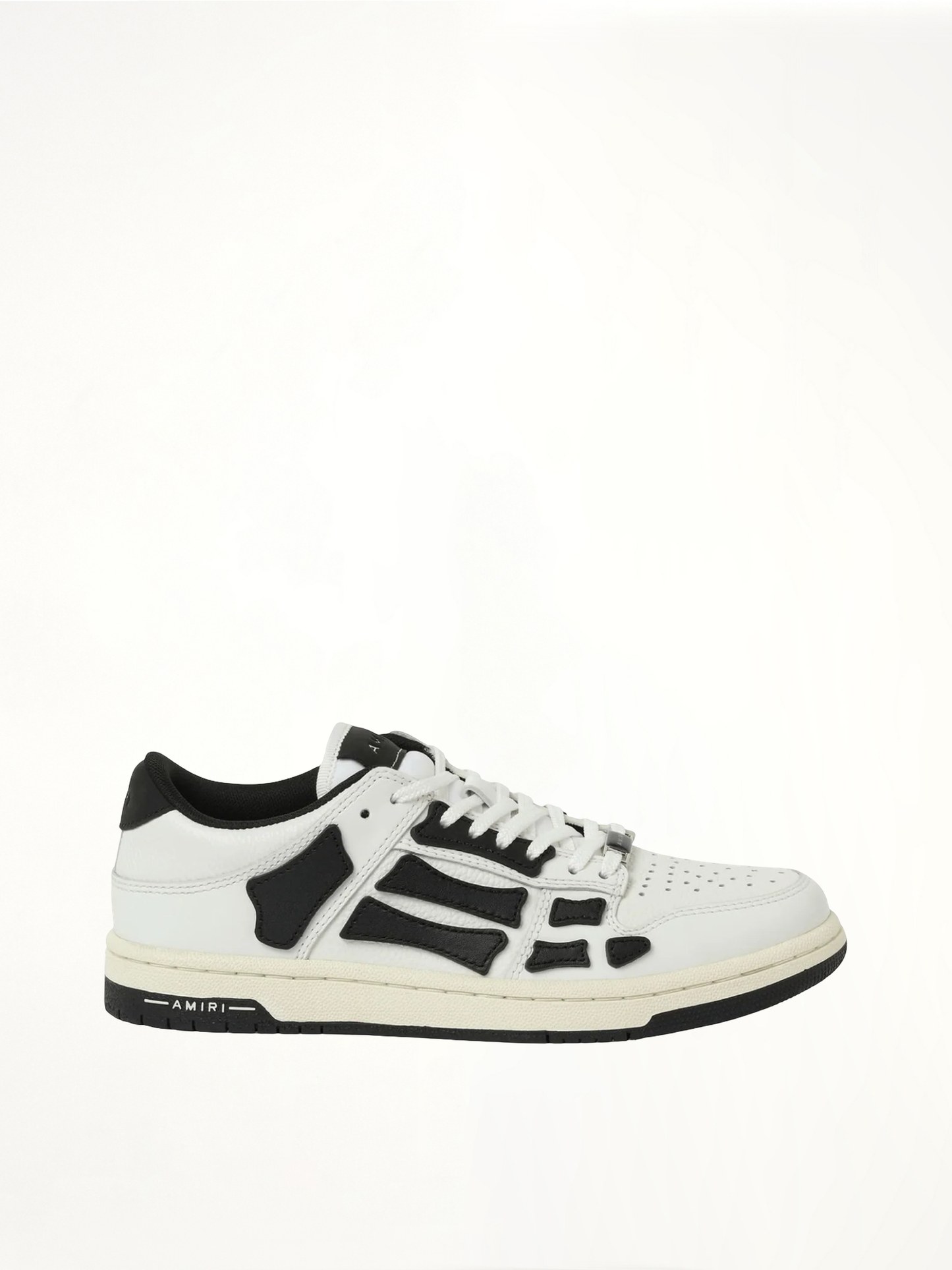 Image of Sneakers. Product name - Skeleton Low Top Sneaker in White colour by brand - AMIRI