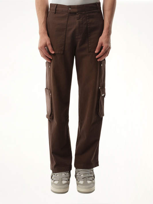Image of a model wearing Pants. Productname: REPRESENT Workshop Pant in BROWN colour by brand - REPRESENT