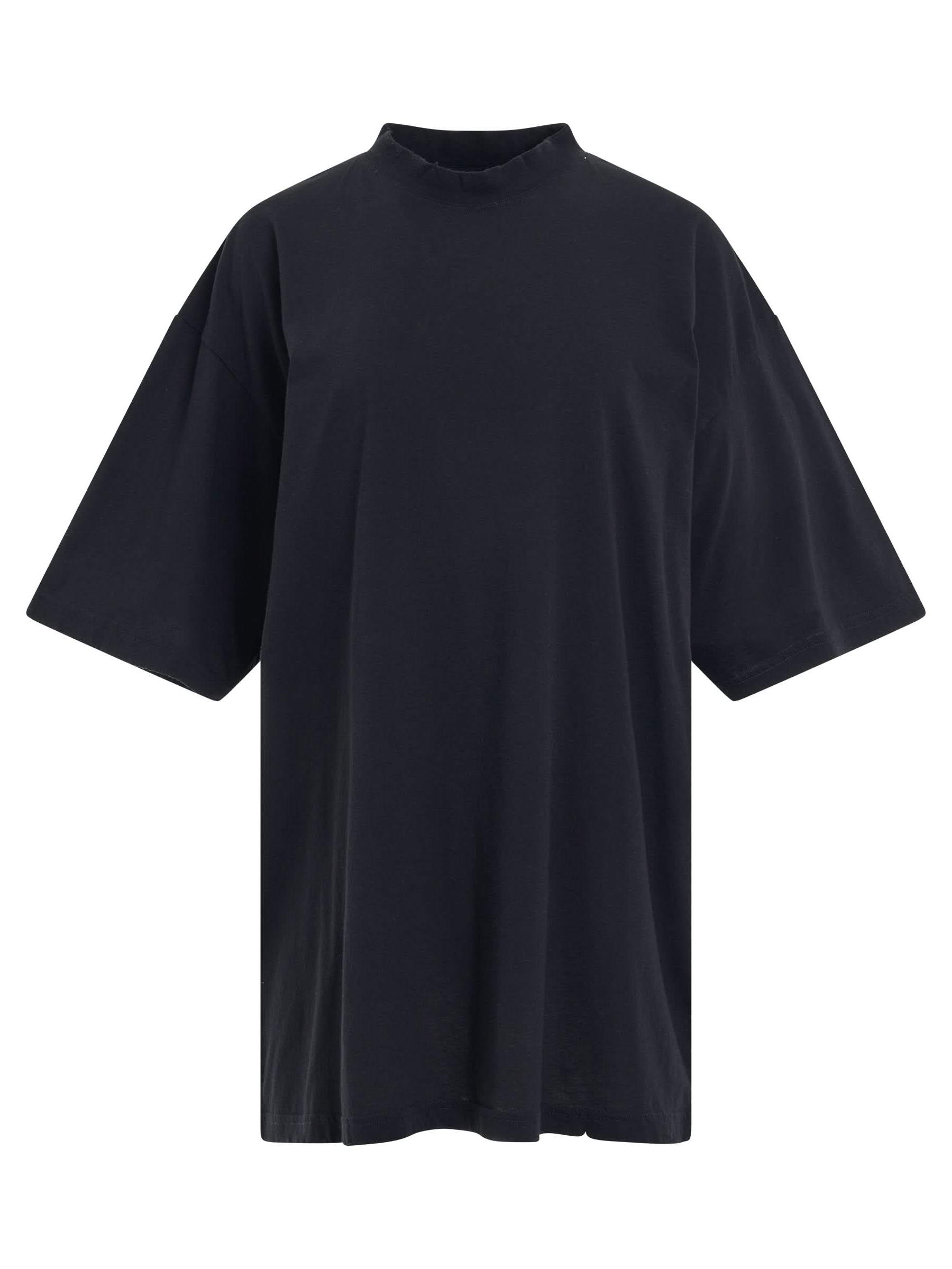 Image of a model wearing Tops. Productname: BALENCIAGA Logo Printed Crewneck T-shirt in BLACK colour by brand - BALENCIAGA
