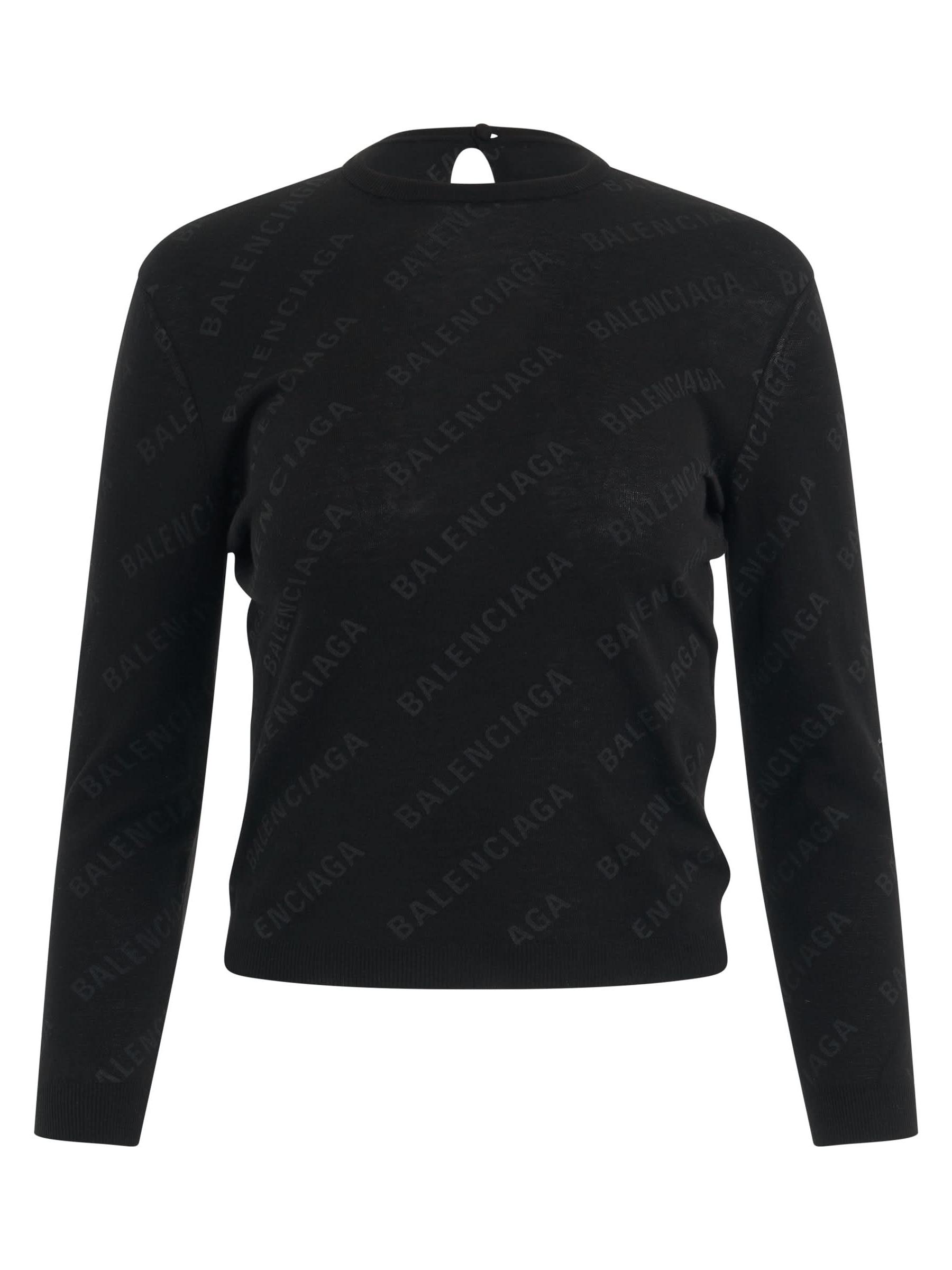 Image of a model wearing Outerwear. Productname: BALENCIAGA Allover Logo Knit Sweater in Black colour by brand - BALENCIAGA