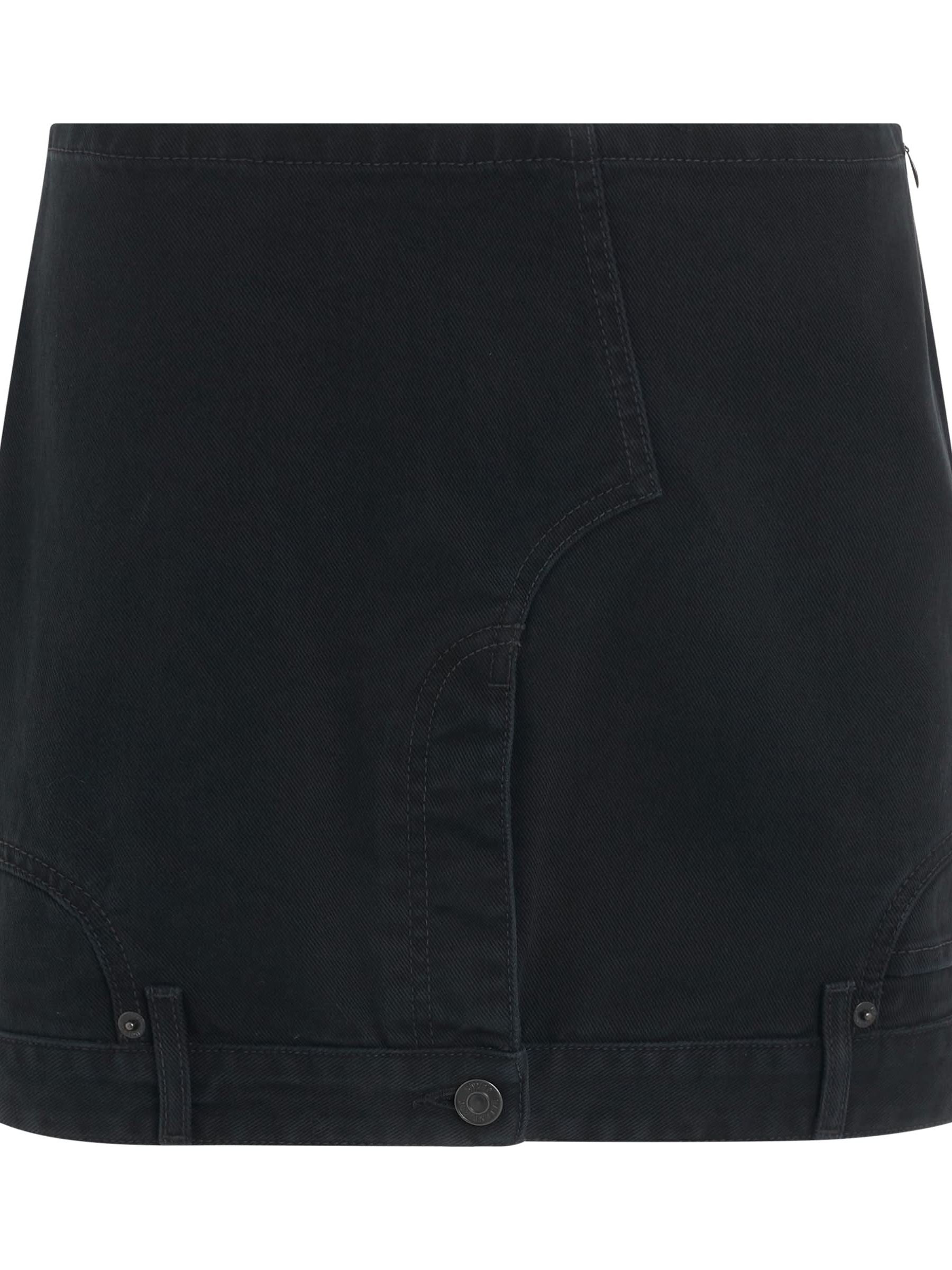 Image of a model wearing Denim. Productname: BALENCIAGA Upside Down Denim Mini Skirt in Black colour by brand - BALENCIAGA