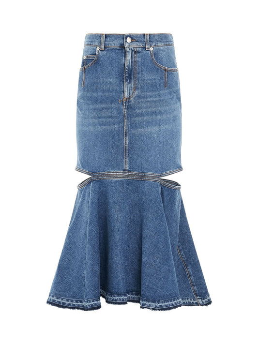 Image of a model wearing Denim. Productname: ALEXANDER MCQUEEN Slashed Midi Denim Skirt in Blue Wash colour by brand - ALEXANDER MCQUEEN