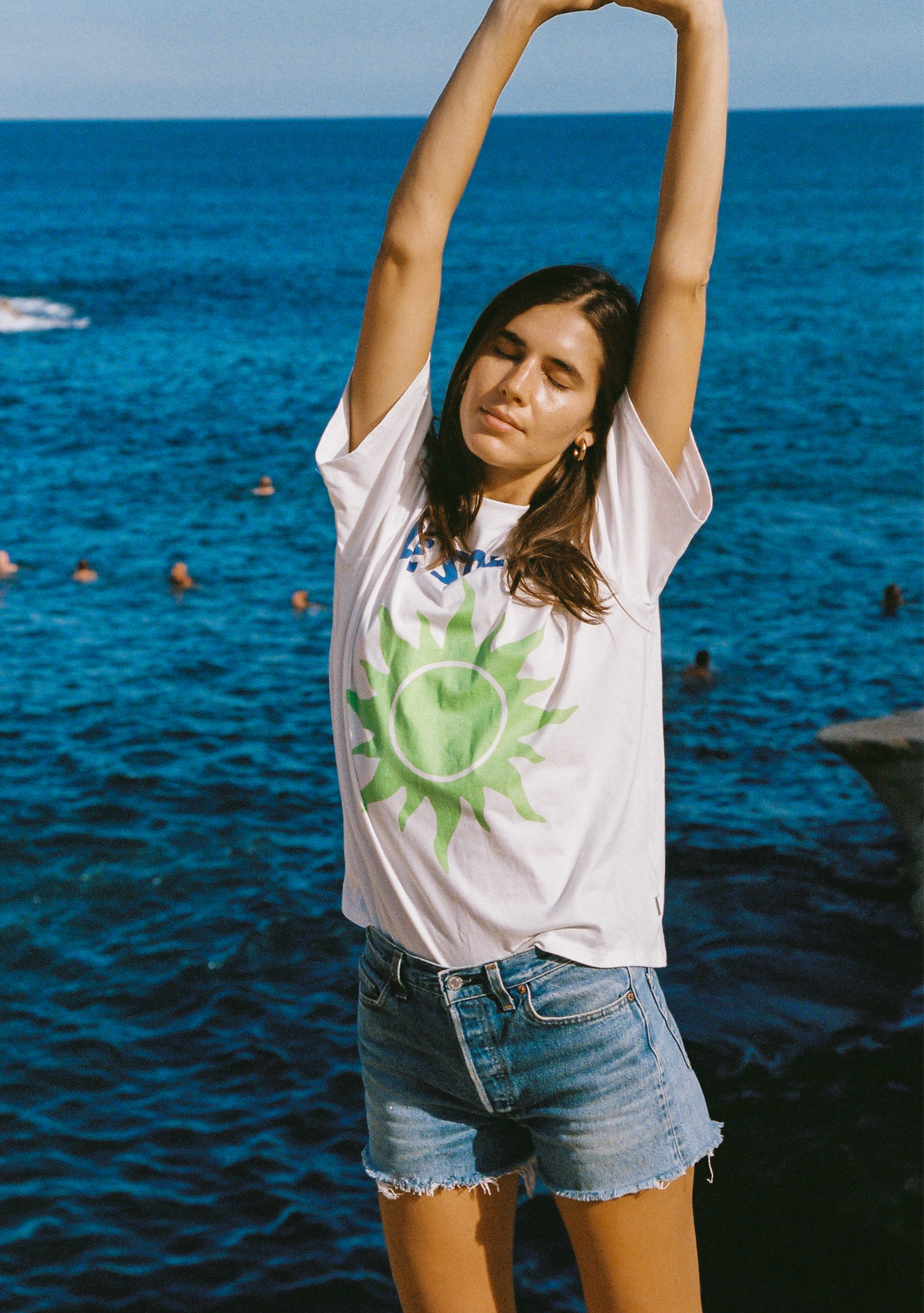 Image of a model wearing Tops. Productname: Auguste The Label Le Soleil Boyfriend Tee in White colour by brand - Auguste The Label
