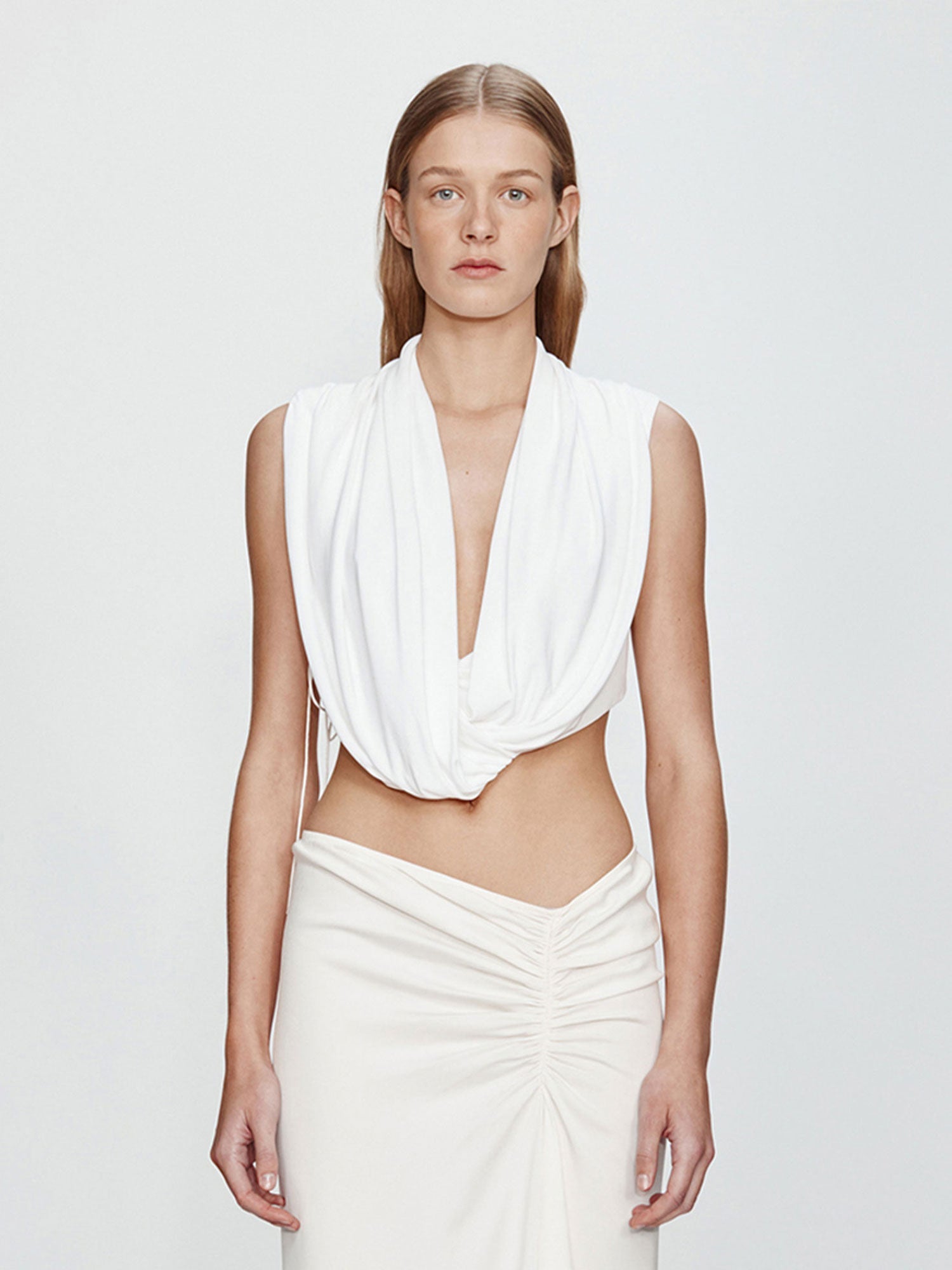 Image of a model wearing Tops. Productname: CHRISTOPHER ESBER Interlock Jersey Drape Top in White colour by brand - CHRISTOPHER ESBER