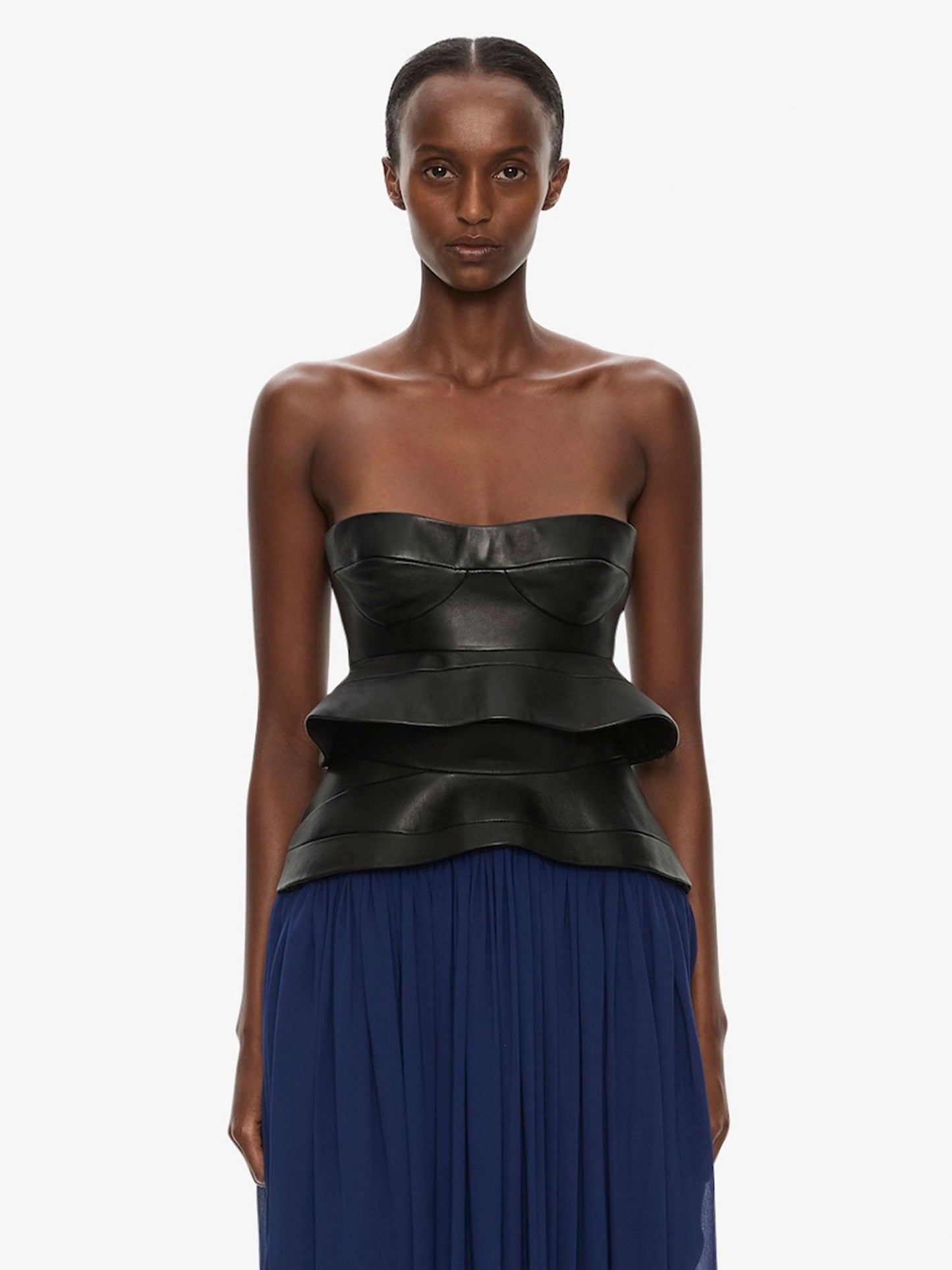 Image of a model wearing Tops. Product name - Bellona Moulded Leather Bodice in Black colour by brand - CHRISTOPHER ESBER