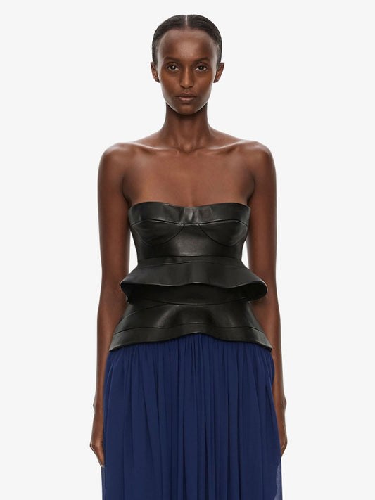 Image of a model wearing Tops. Product name - Bellona Moulded Leather Bodice in Black colour by brand - CHRISTOPHER ESBER