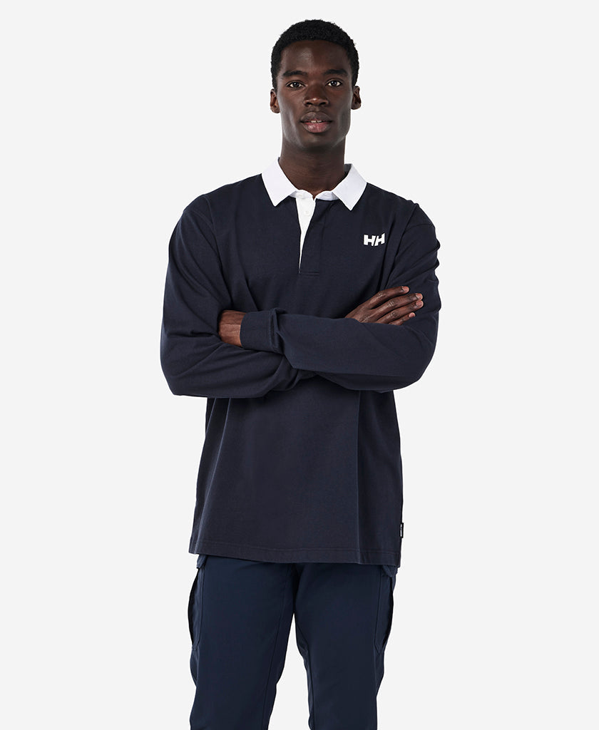 Image of a model wearing Tops. Product name - OFFSHORE L/S RUGGA, Navy in Navy colour by brand - Helly Hansen