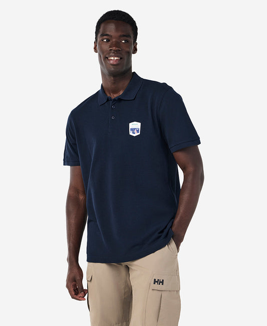 Image of a model wearing Tops. Product name - RSHYR25 CREW POLO, Navy in Navy colour by brand - Helly Hansen