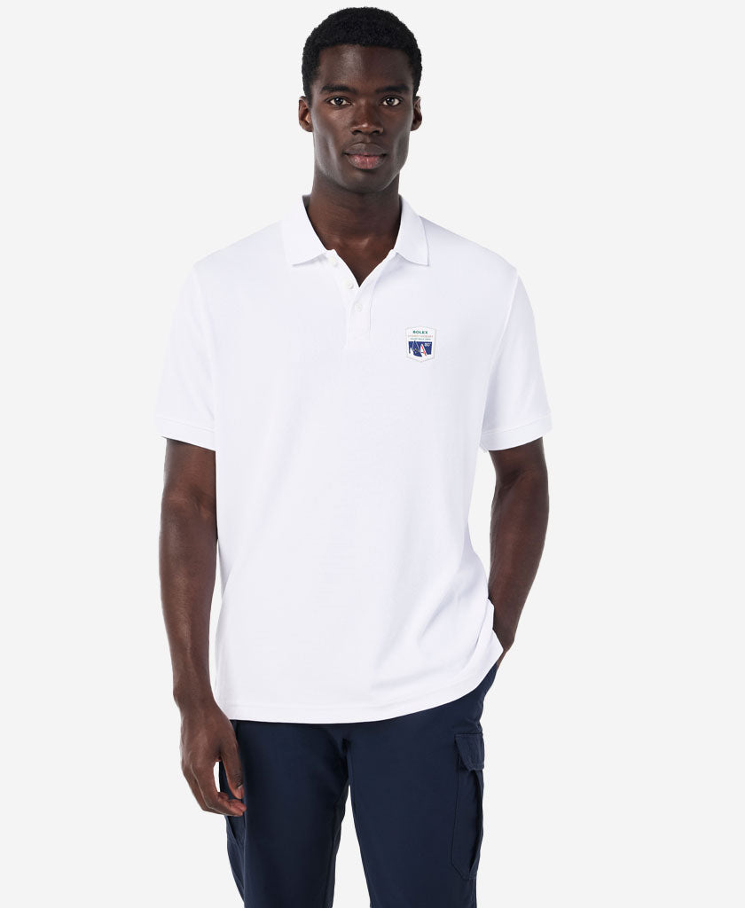 Image of a model wearing Tops. Product name - RSHYR25 FLEET POLO, White in White colour by brand - Helly Hansen
