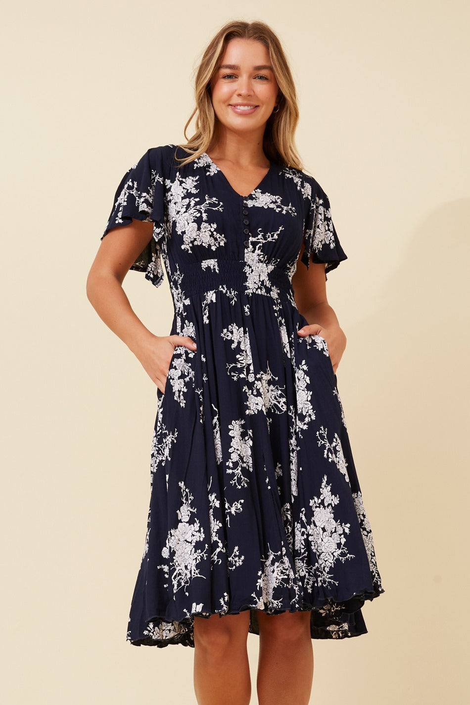 Image of Dresses. Product name - SANDY FLORAL SHORT DRESS in Navy colour by brand - Caroline Morgan Australia
