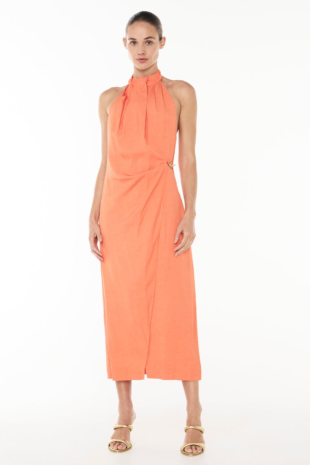 Image of a model wearing Tops. Productname: La Promenade Halter Dress in CORAL colour by brand - Manning Cartell