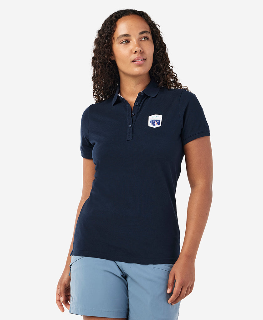 Image of a model wearing Tops. Product name - RSHYR25 W CREW POLO, Navy in Navy colour by brand - Helly Hansen