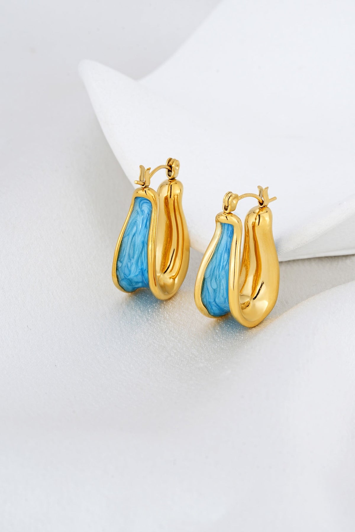 Image of Accessories. Product name - Lucine Blue Gold Earrings in Blue colour by brand - HEYCHIC