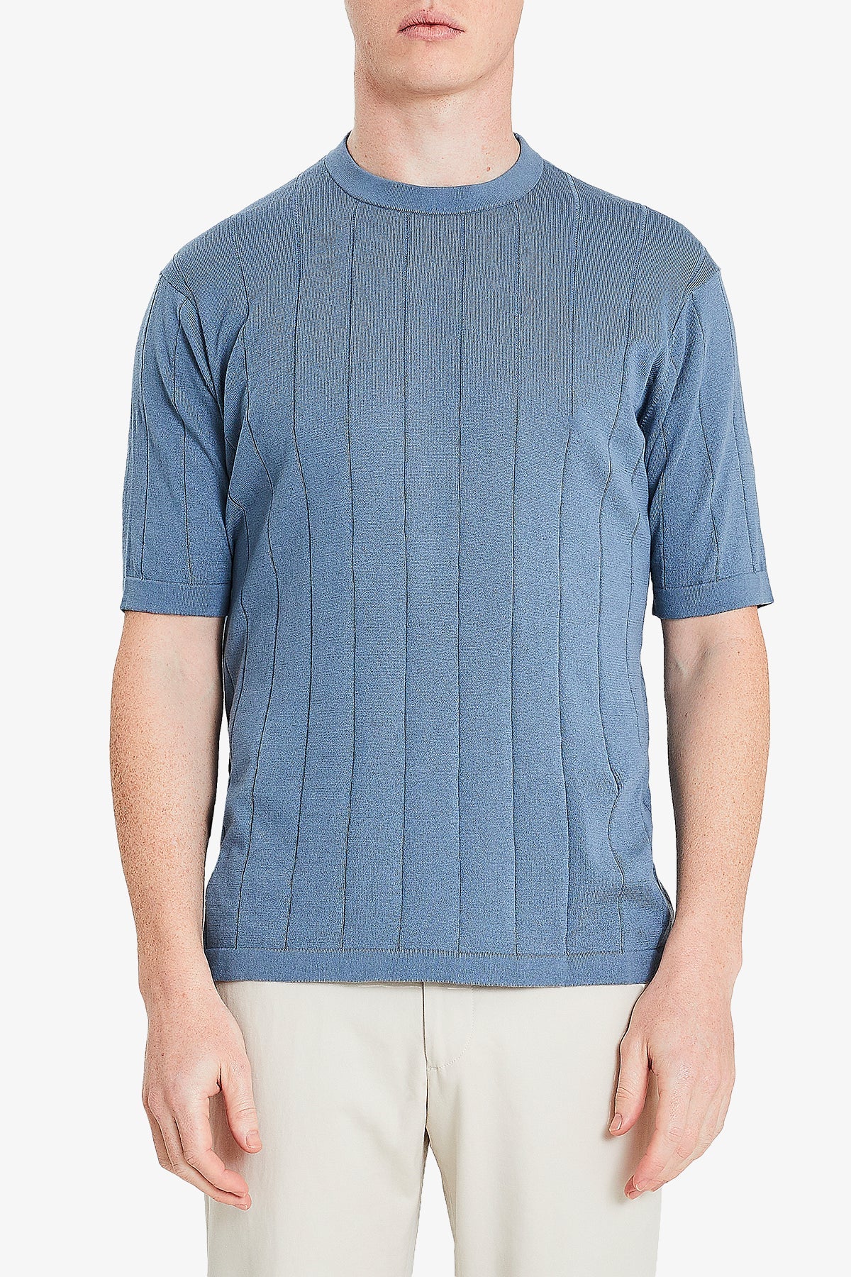 Image of a model wearing Tops. Productname: Anthony Squires Aviation Knitted Tee - Light Blue in Blue colour by brand - Anthony Squires