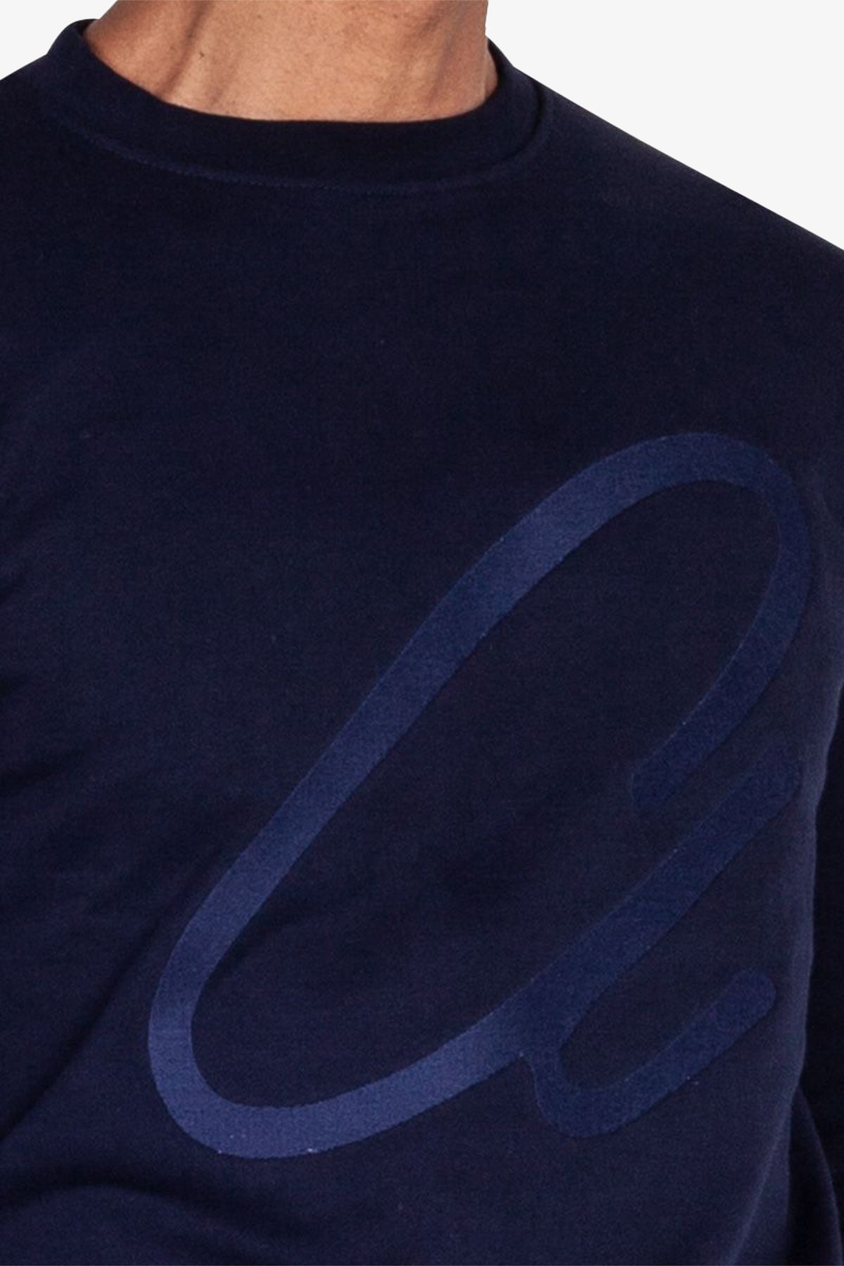 Image of a model wearing Outerwear. Product name - Elmer Navy Sweatshirt in Navy colour by brand - Anthony Squires