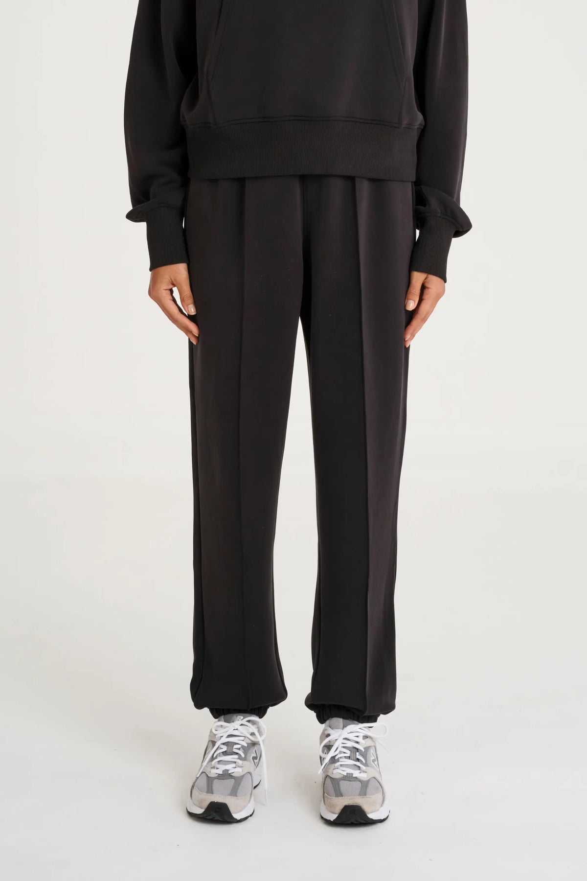 Image of Activewear. Product name - Soft Luxury Cuffed Track Pant in Black colour by brand - All Fenix