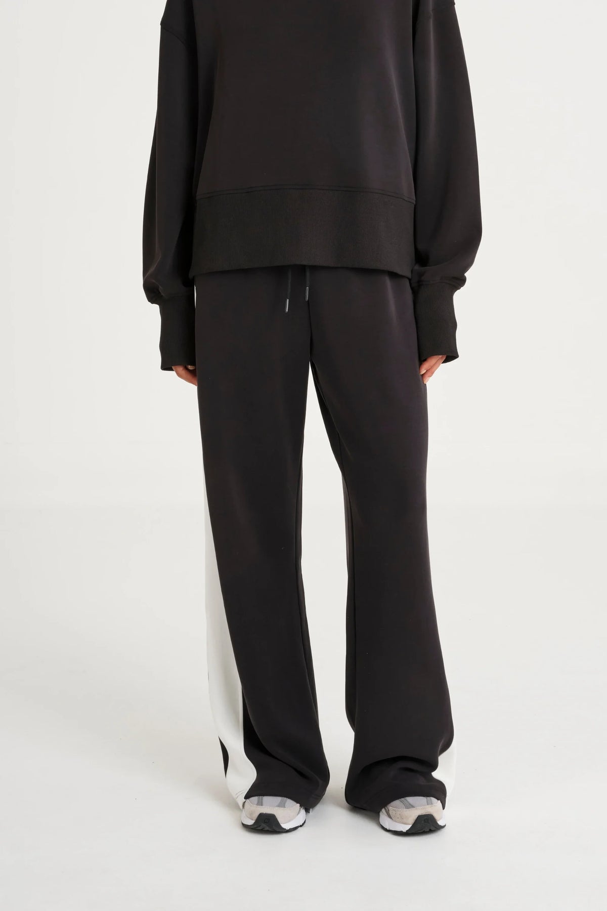 Image of Activewear. Product name - Soft Luxury Contrast Wide Leg Track Pant in Black colour by brand - All Fenix