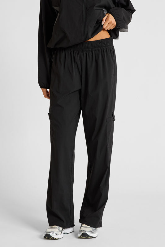 Image of Activewear. Product name - Spray Wide Leg Pocket Pant in Black colour by brand - All Fenix