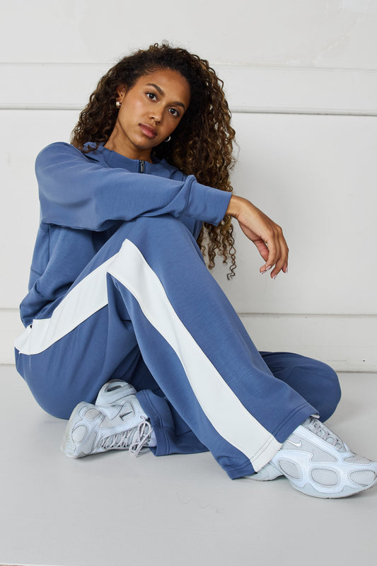 Image of a model wearing Pants. Product name - Soft Essentials Contrast Wide Leg Pant Blue Indigo/Chalk in Blue colour by brand - All Fenix